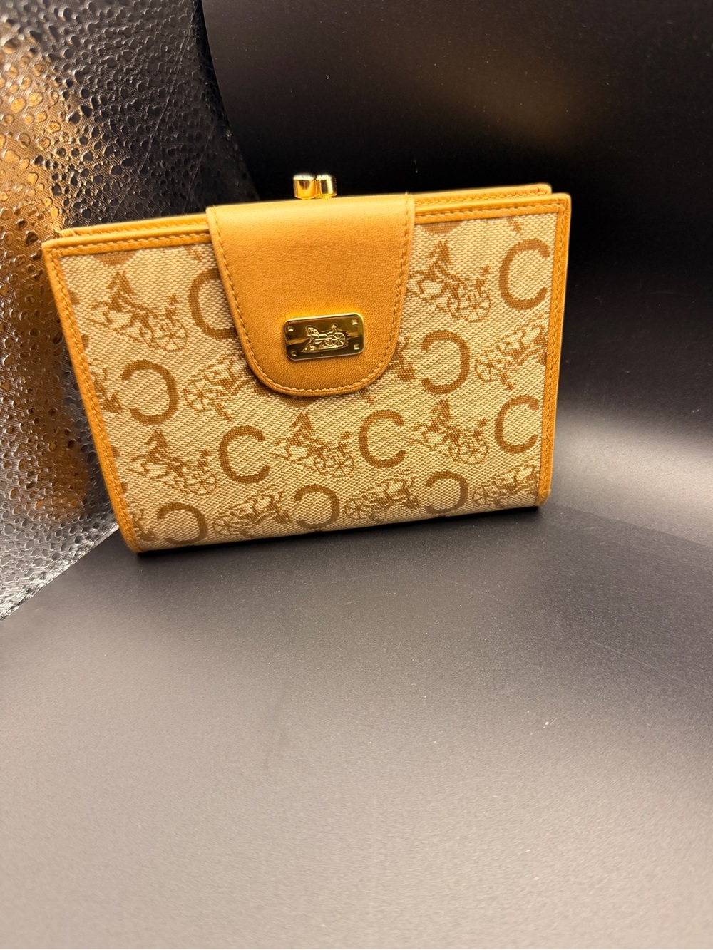 Authentic vintage Celine wallet featuring the classic Horse Carriage and “C” COA